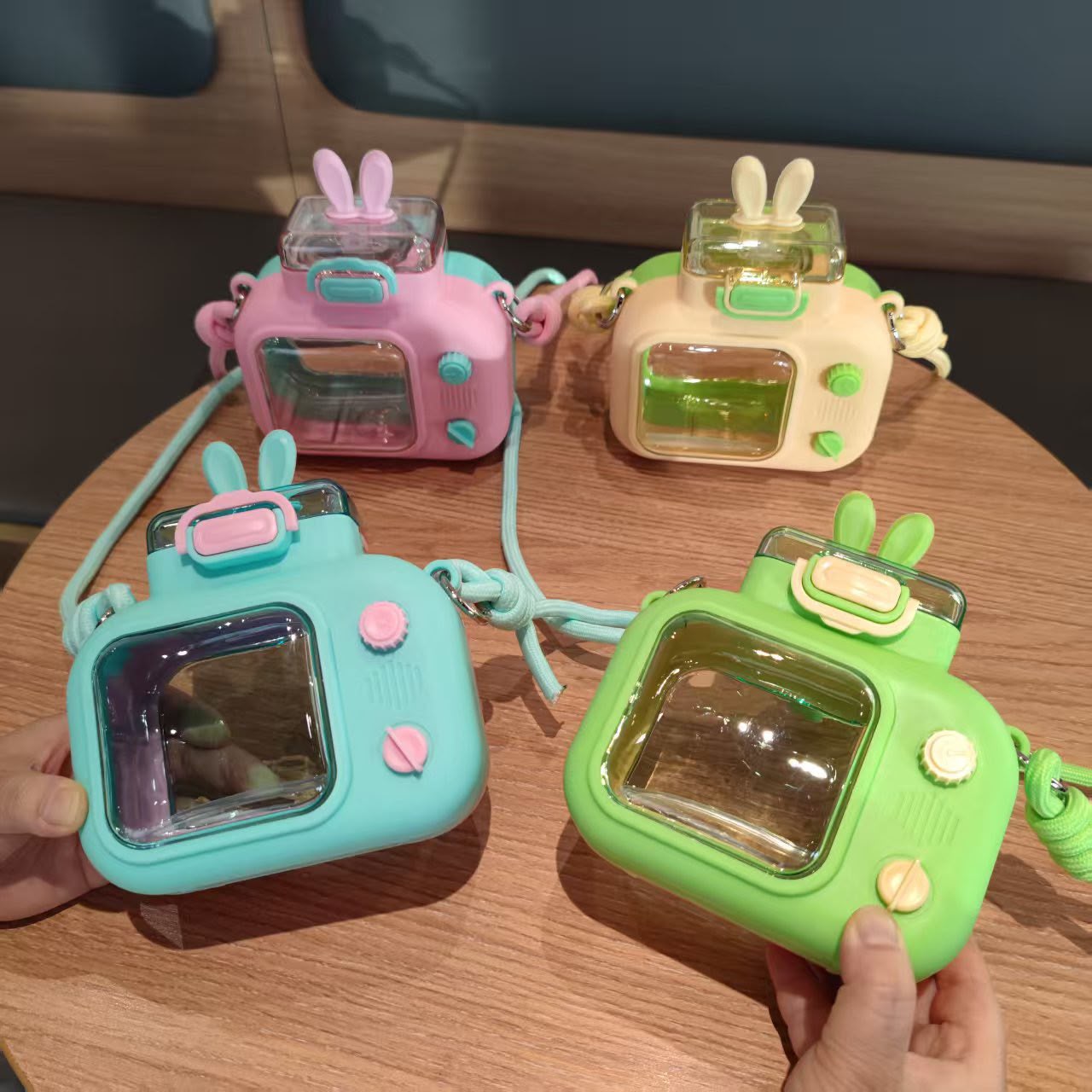 600ml Cute Camera-Shaped Water Bottle with Bunny Ears & Adjustable Shoulder Strap – Portable Leak-Proof Sippy Cup for Kids & Adults
